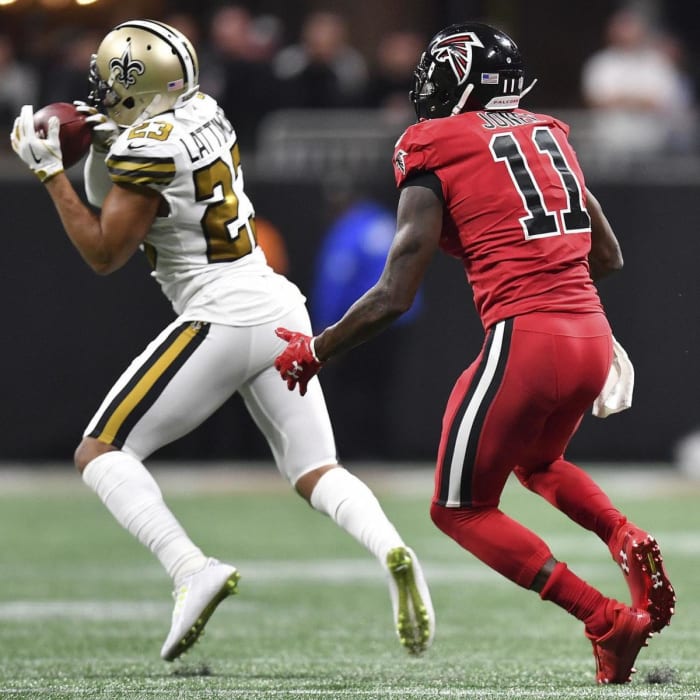 Saints CB Marshon Lattimore (23) intercepts a pass intended for former Atlanta WR Julio Jones (11). Credit: Nola.com